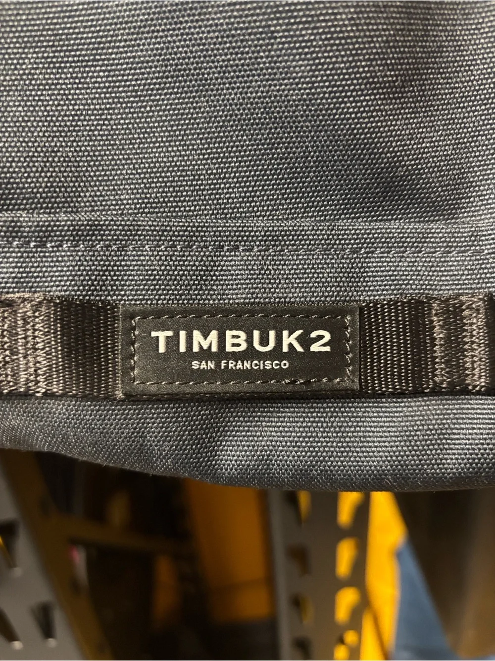 Timbuk2 Navy Roll-Top Backpack with Olive Strap and Red Zipper